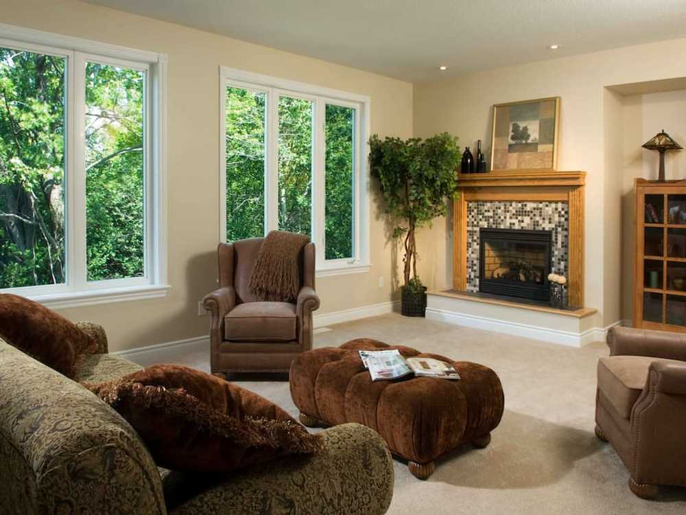 A carpet living room from a house built by LandArk Homes