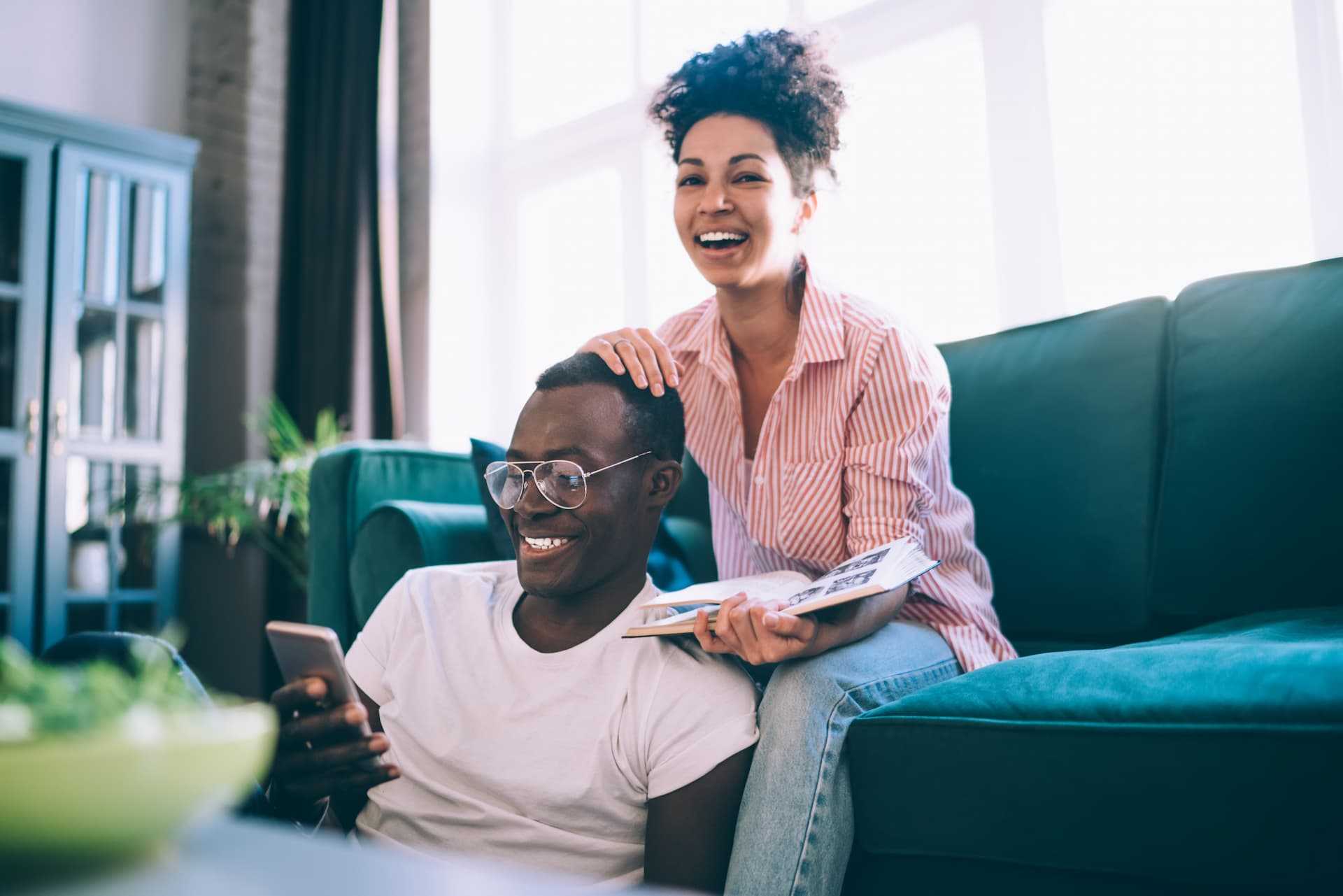 A young couple enjoying their home.